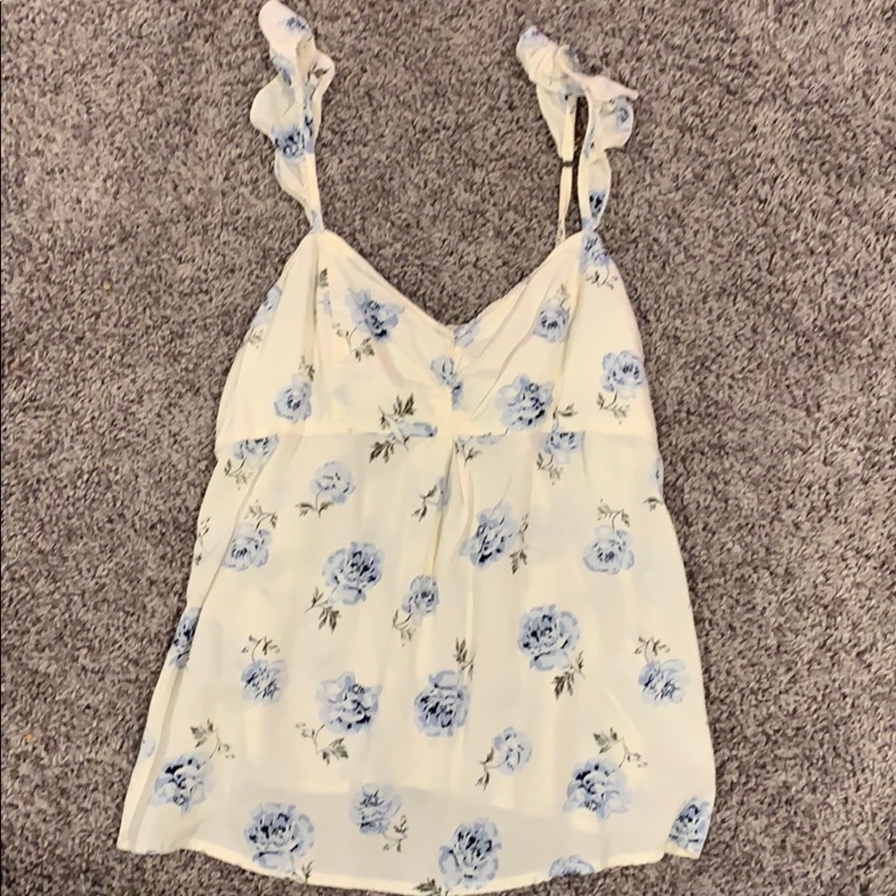 White blouse with blue flowers